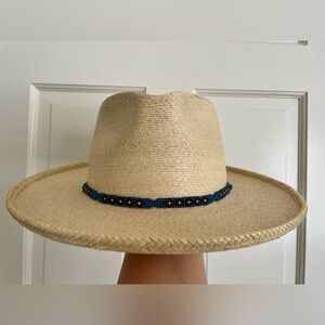 Brand new Overland Women’s hat , size Medium , detailed bead work